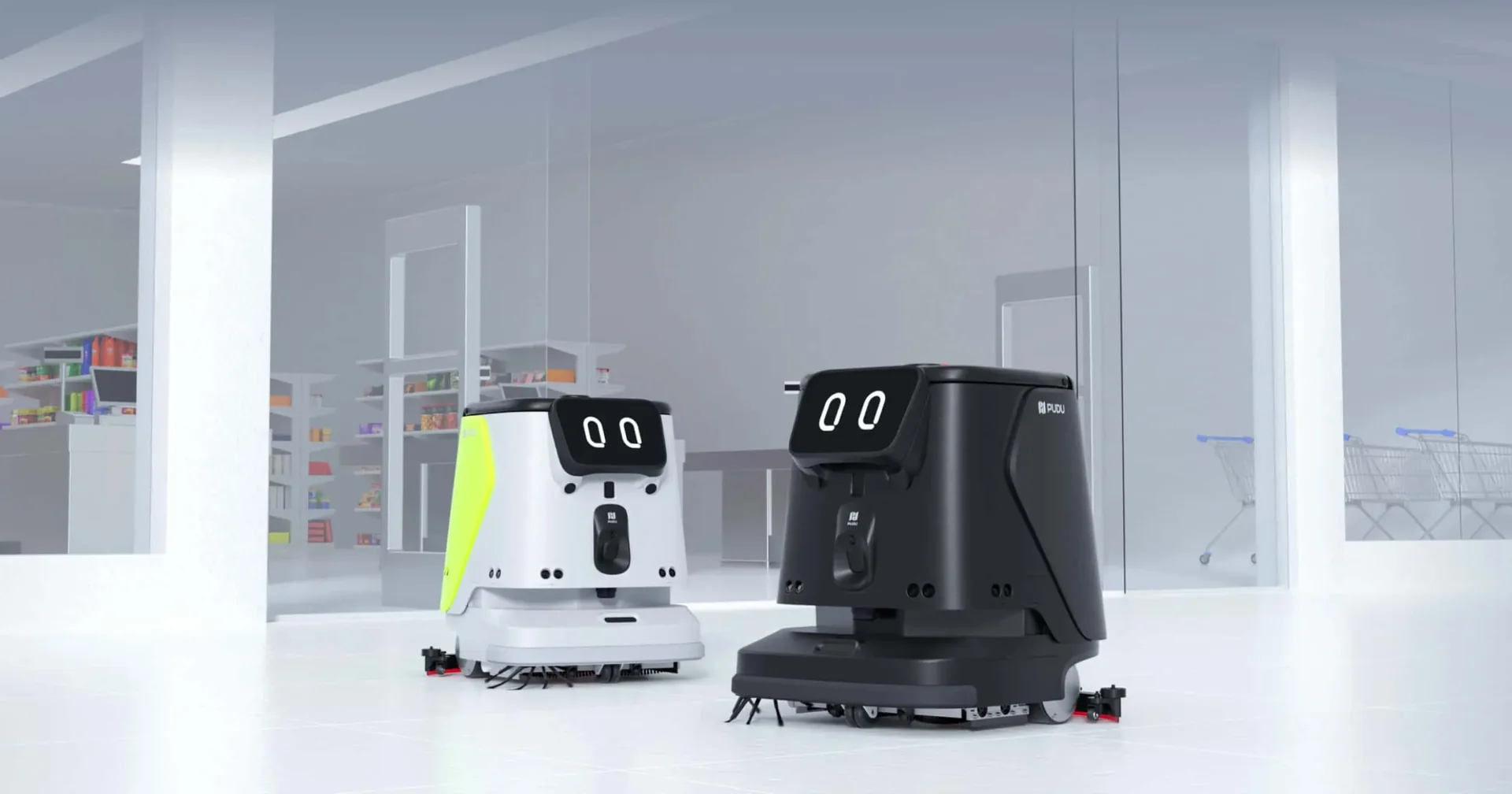 Two commercial floor cleaning robots in a retail space